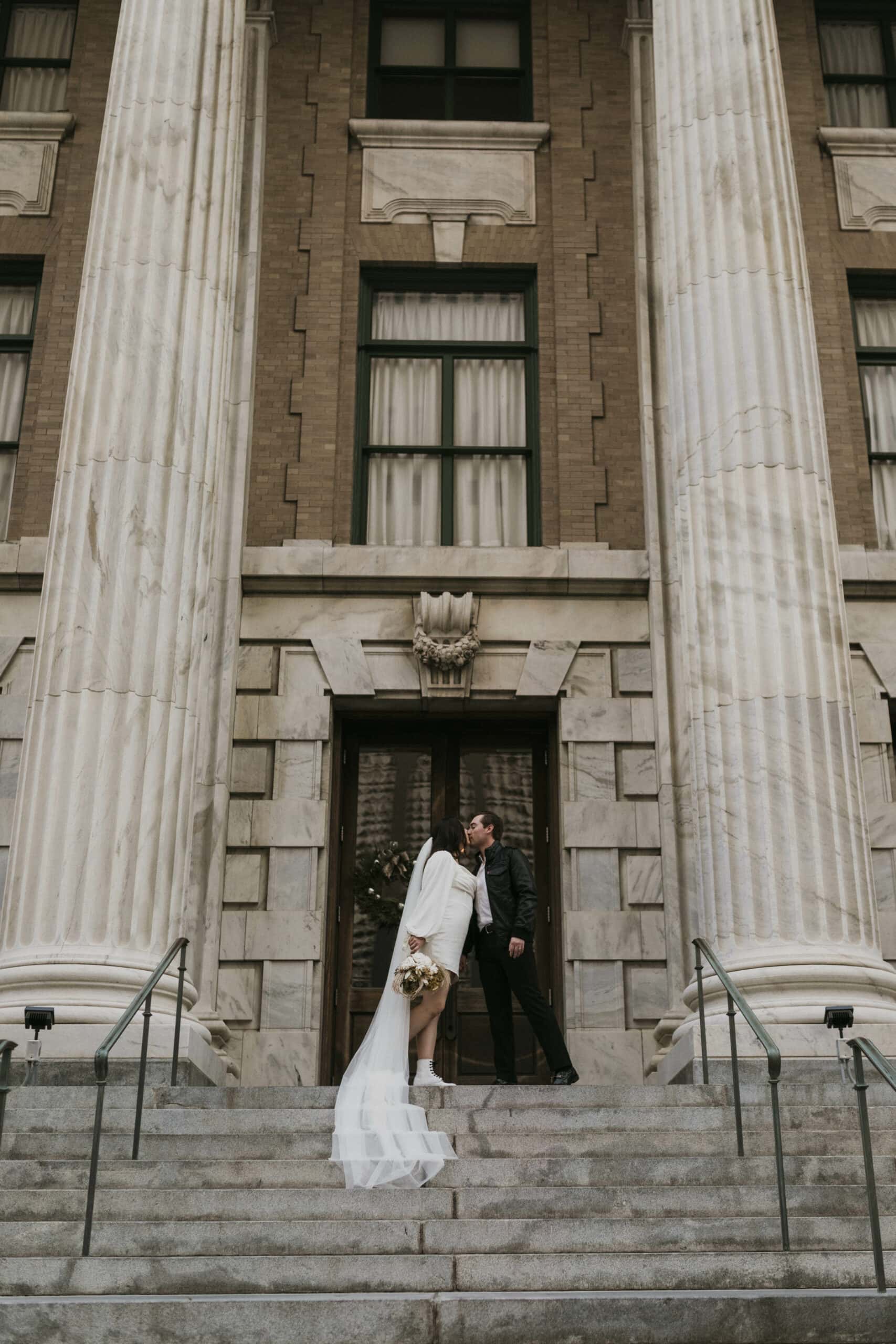 downtown tampa elopement with rooftop ceremony and pizza