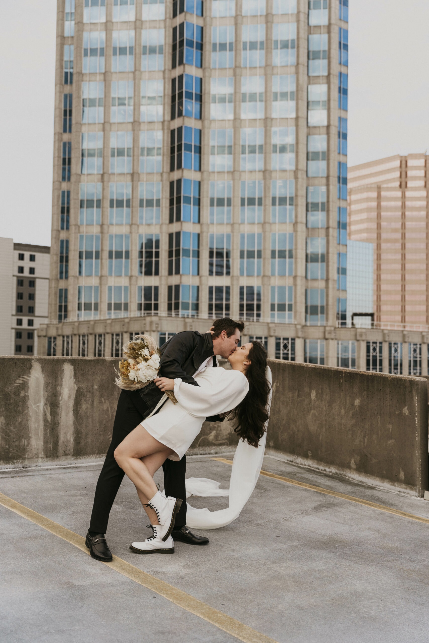 downtown tampa elopement with rooftop ceremony and pizza