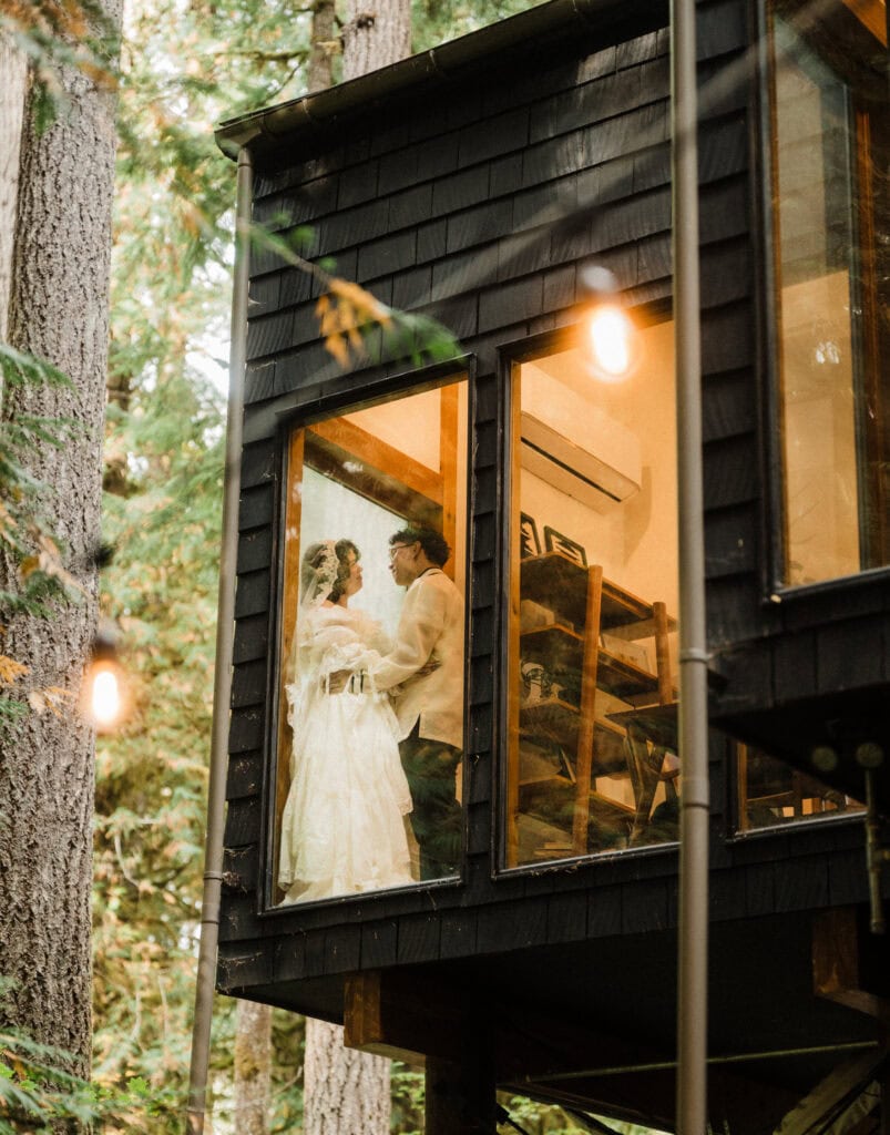 bride and groom at a cozy forest cabin during their north cascades elopement day
