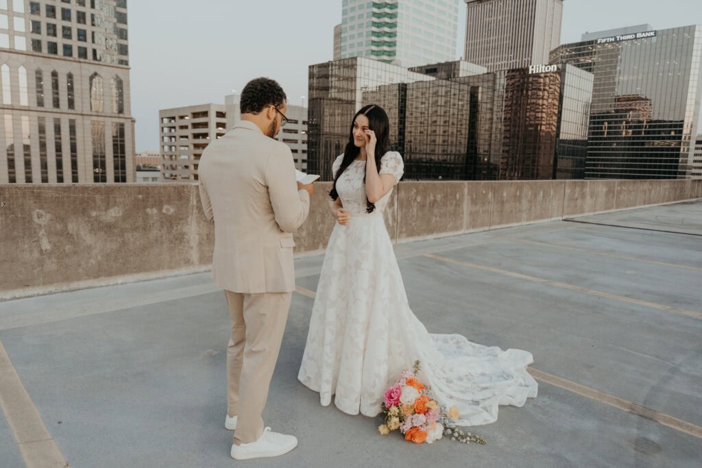 tampa elopement photographer with couple exchanging vows