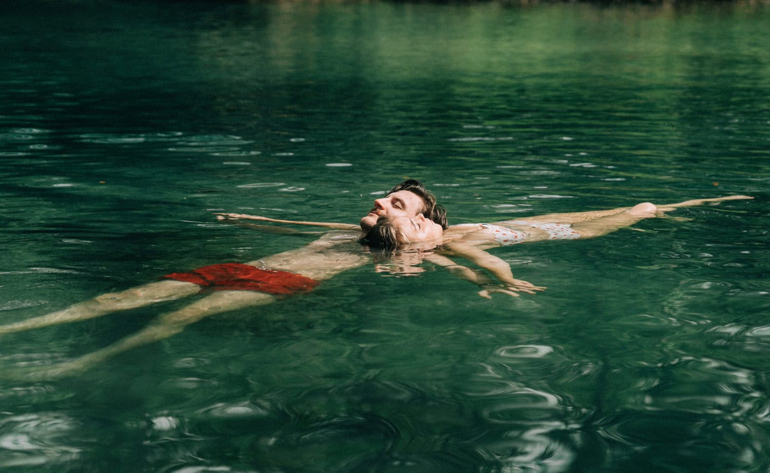 a couple floats in clear spring waters in florida