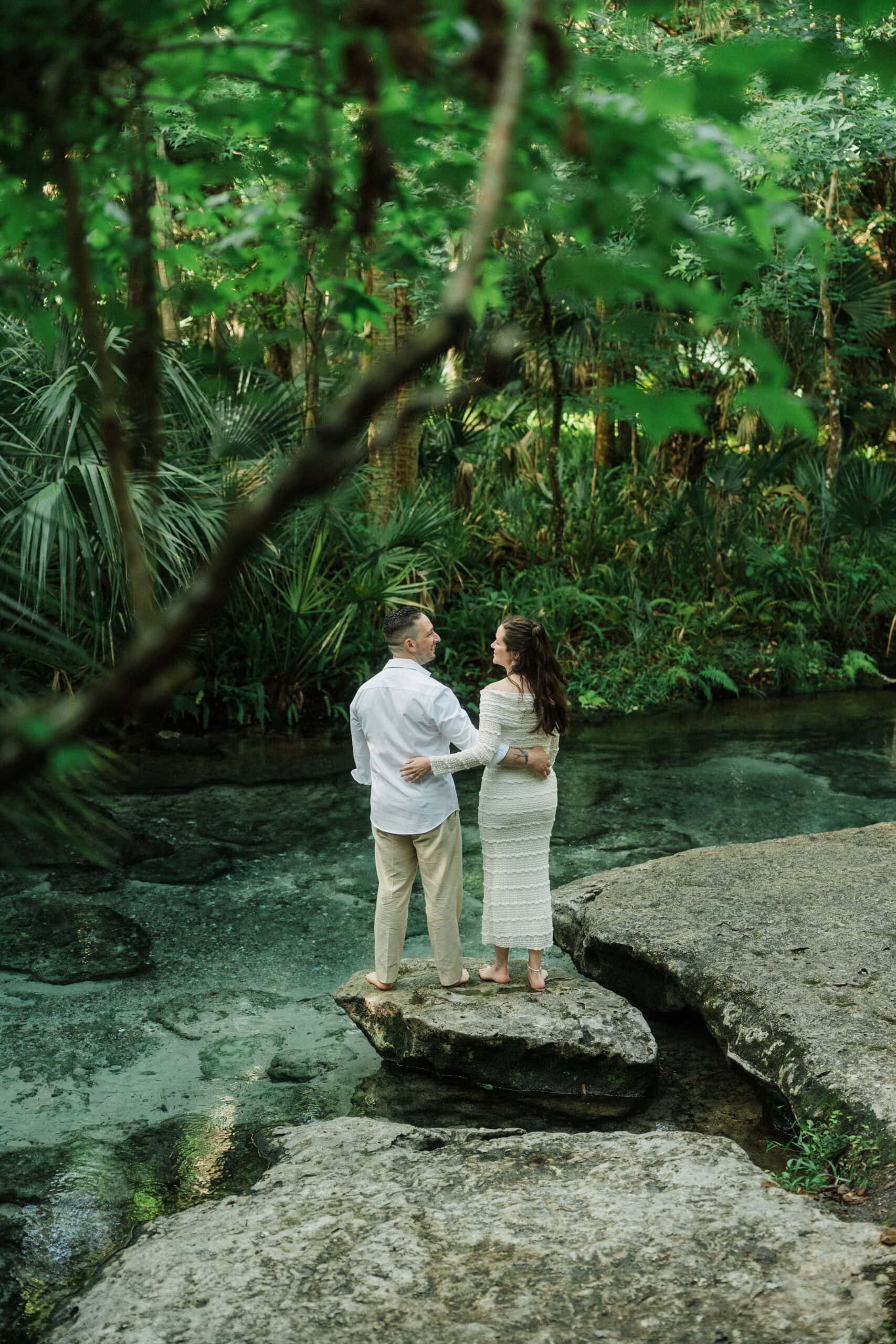 playful elopement couple hugging during their florida springs elopement