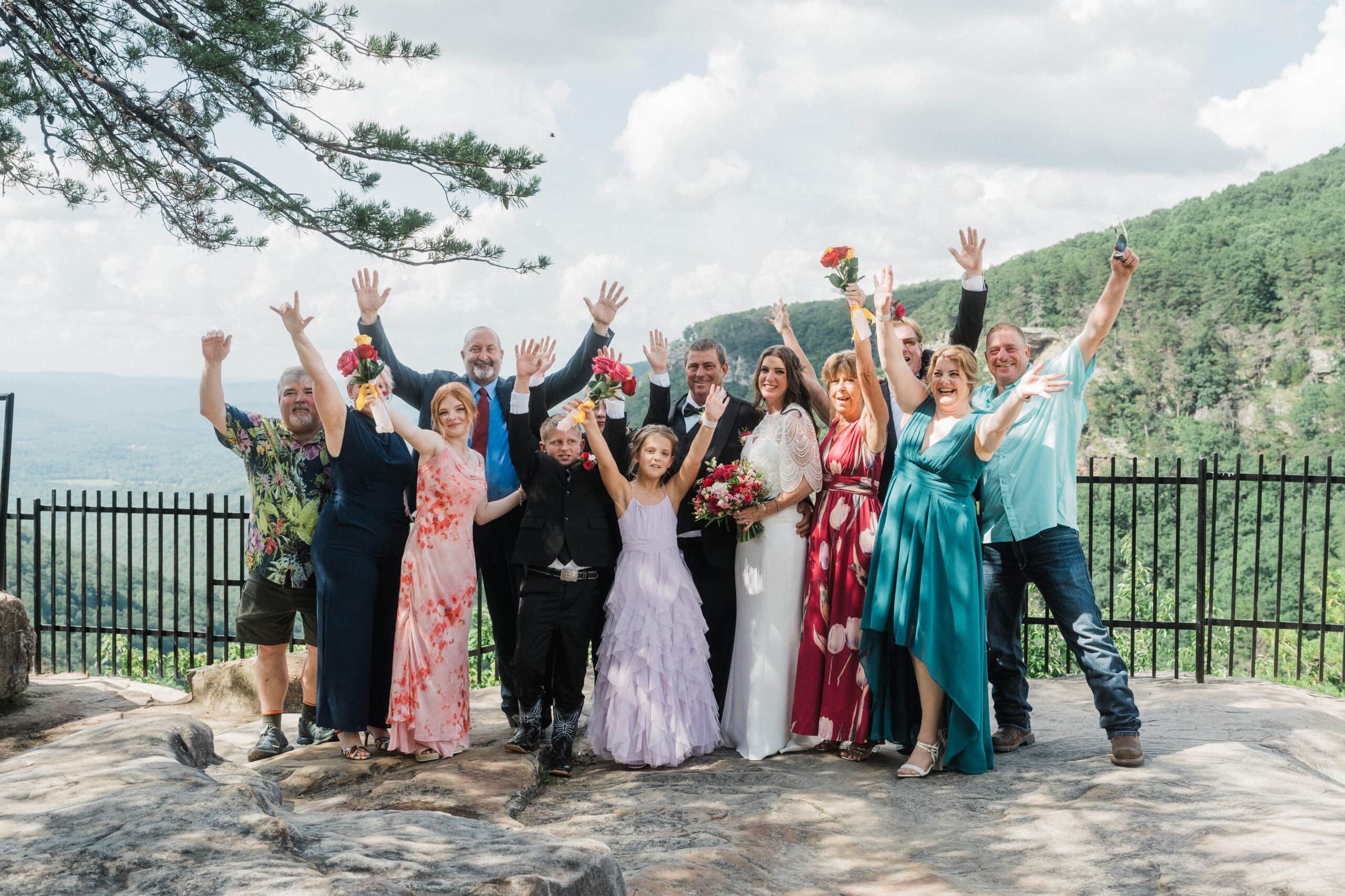 elopement couple and their family at a mountain overlook in cloudland canyon