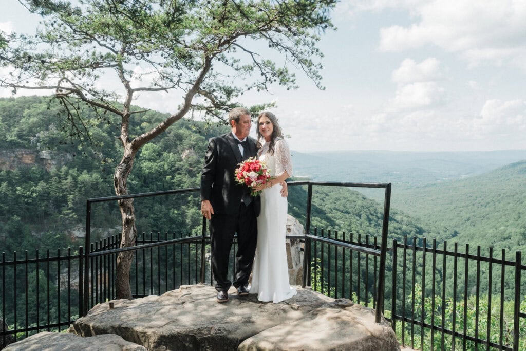 elopement couple at a mountain overlook in cloudland canyon