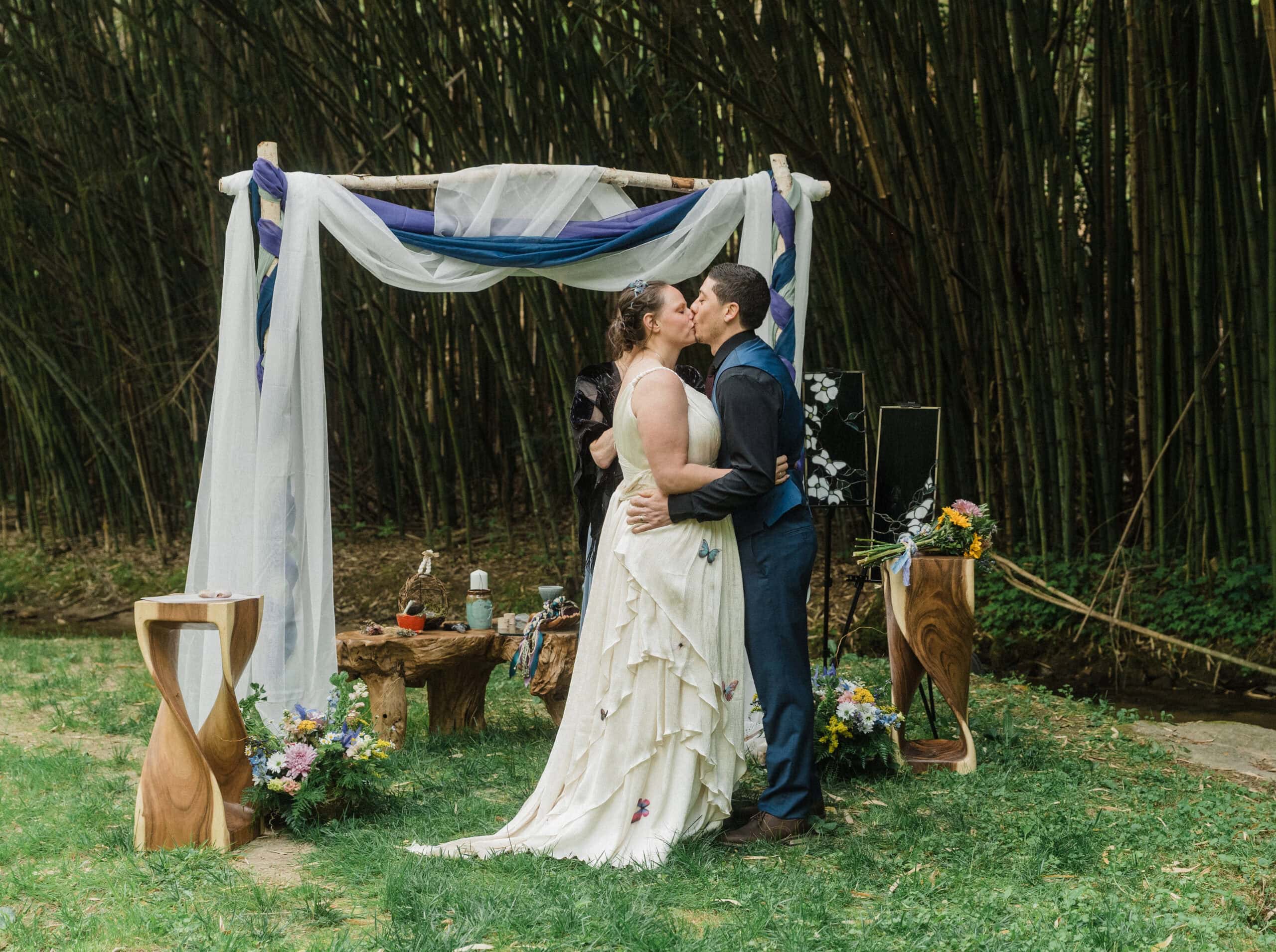 elopement couple kissing during their ceremony