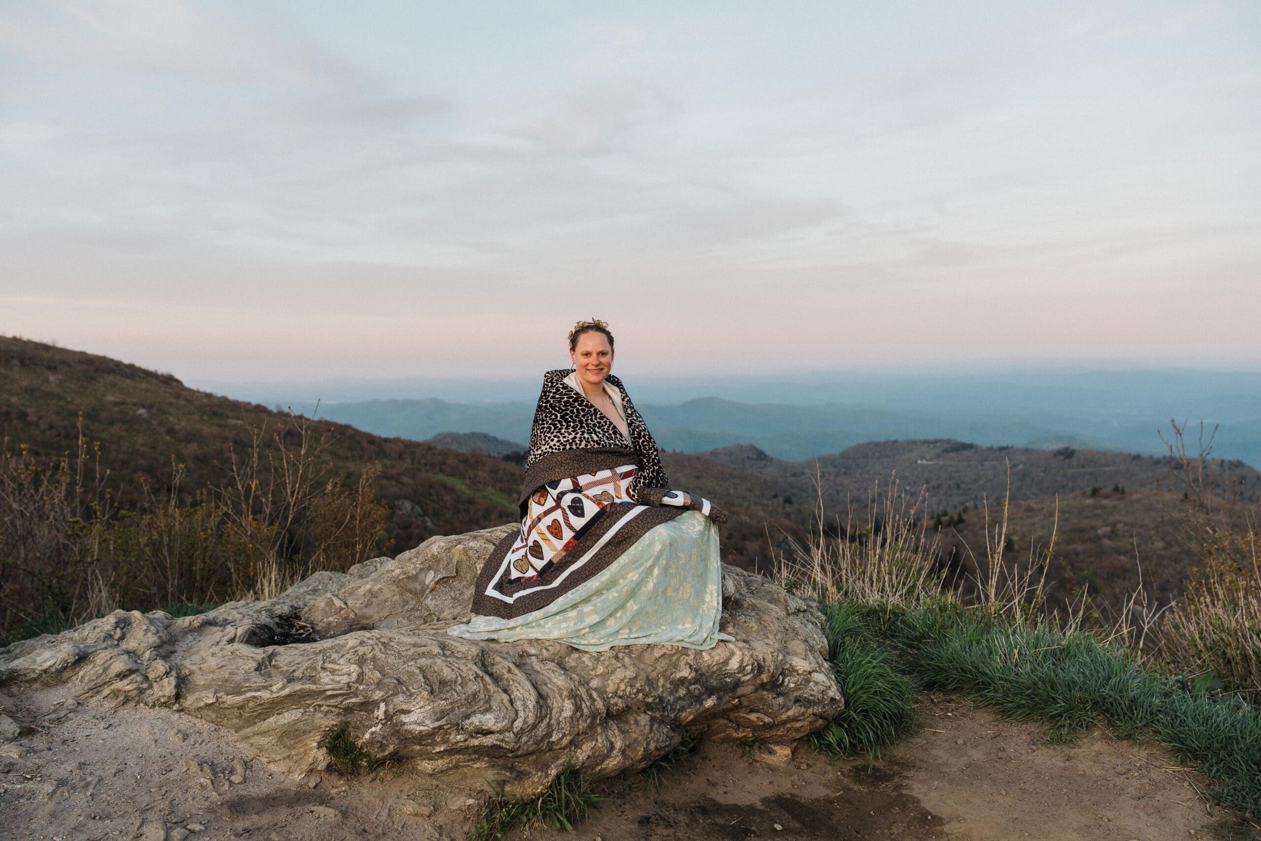 bride at a mountain overlook during their blue ridge parkway elopement