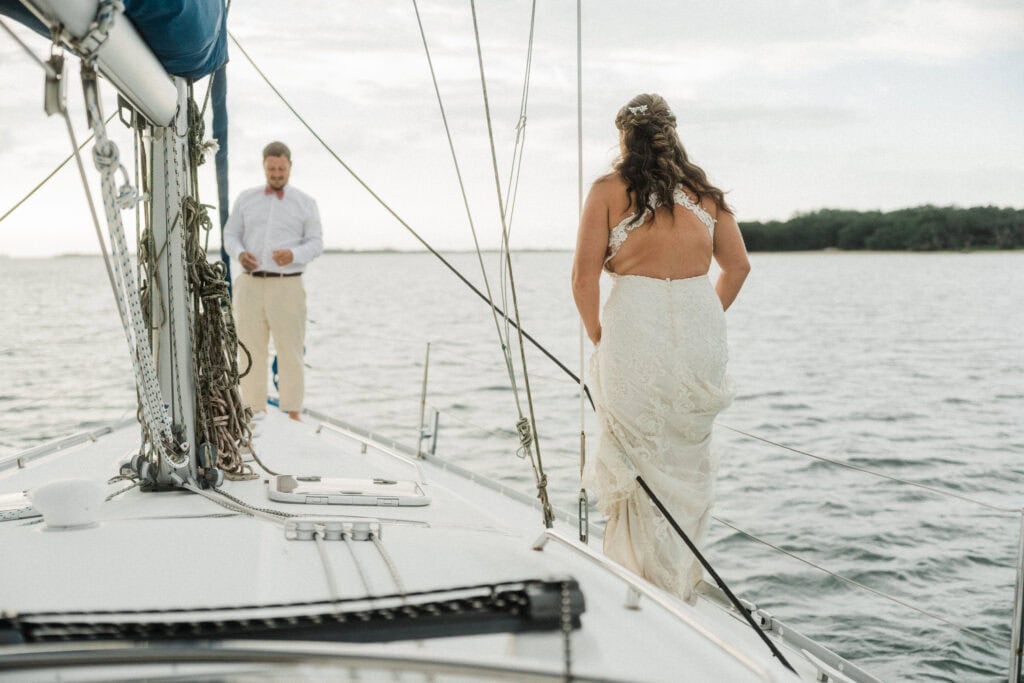 elopement couple on a sailboat during their florida sailboat elopement day