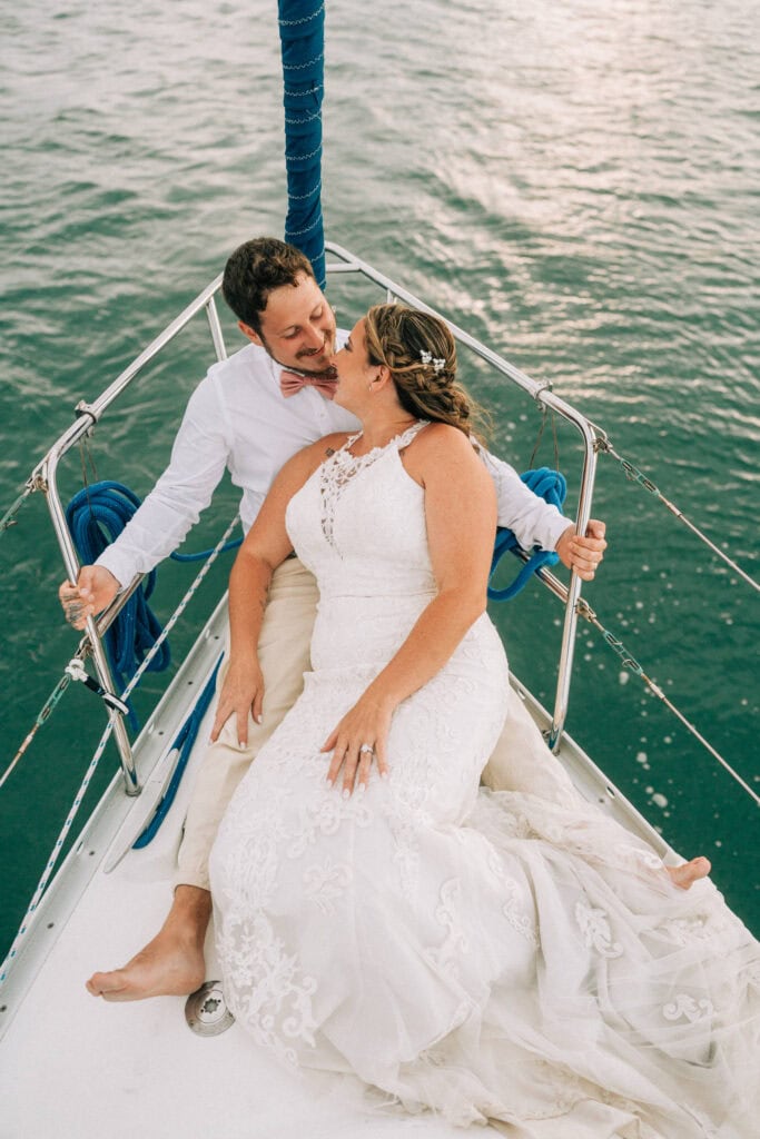 elopement couple on a sailboat during their florida sailboat elopement day