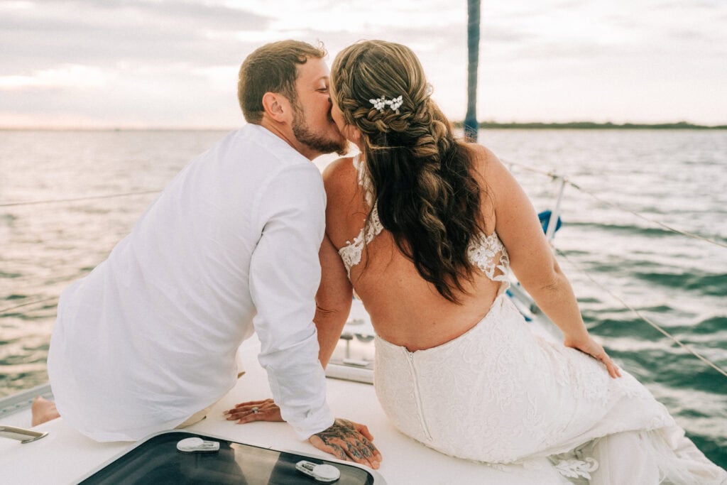 elopement couple on a sailboat during their florida sailboat elopement day