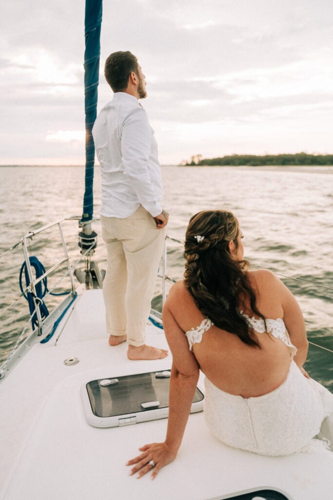 elopement couple on a sailboat during their florida sailboat elopement day