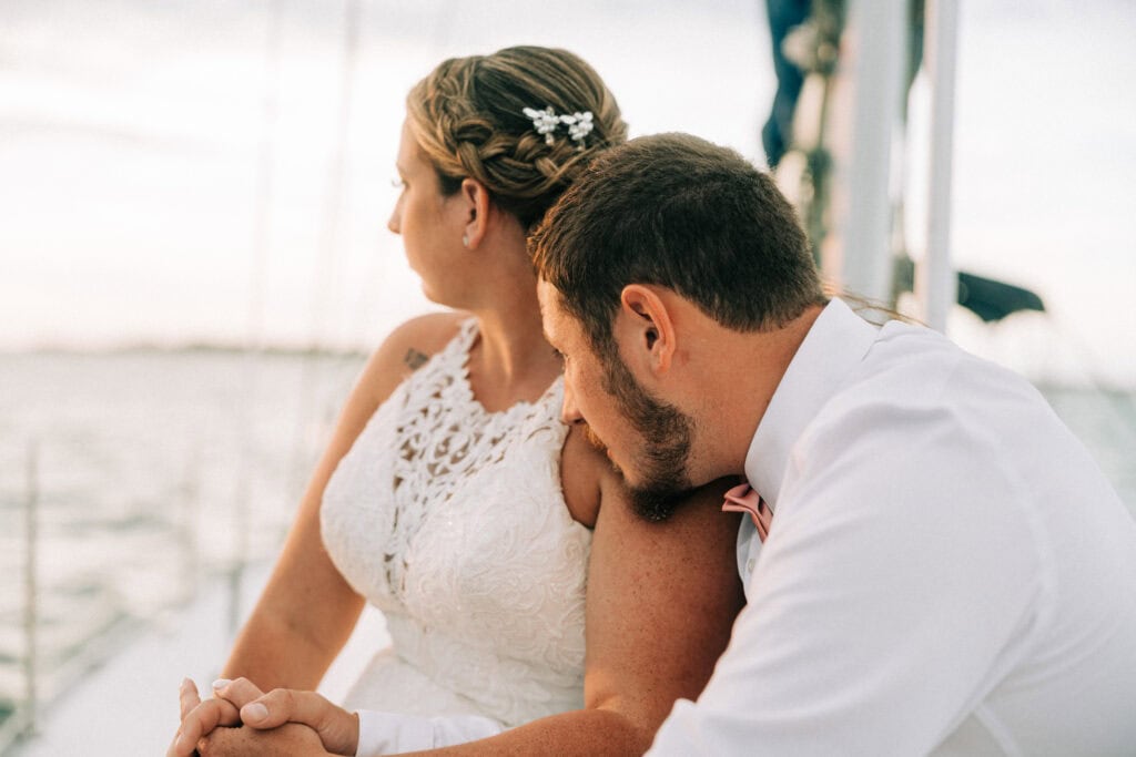 elopement couple on a sailboat during their florida sailboat elopement day