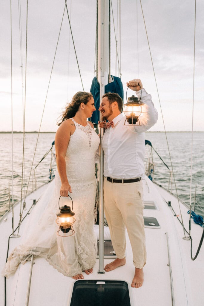 elopement couple on a sailboat during their florida sailboat elopement day