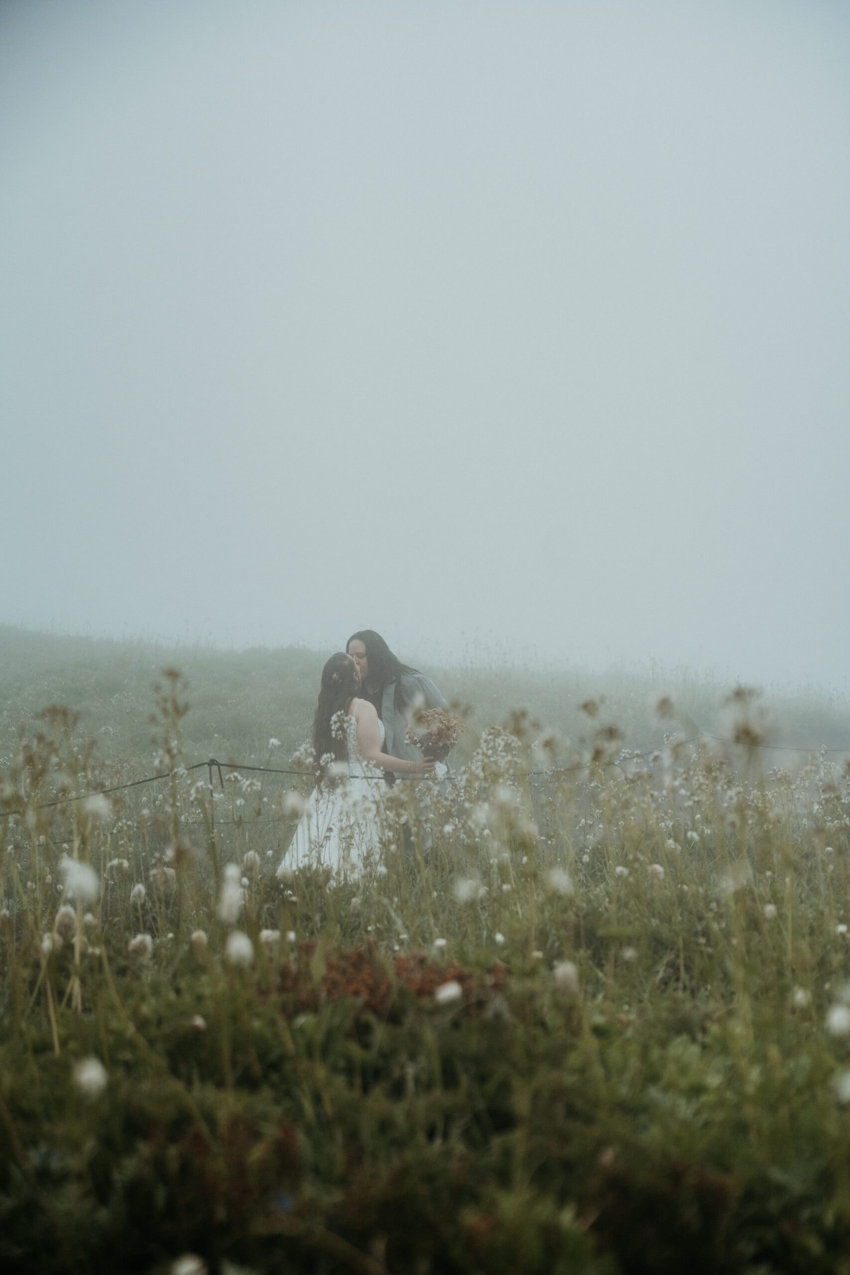 elopement couple in wildflower field during their mt rainier wildflower elopement