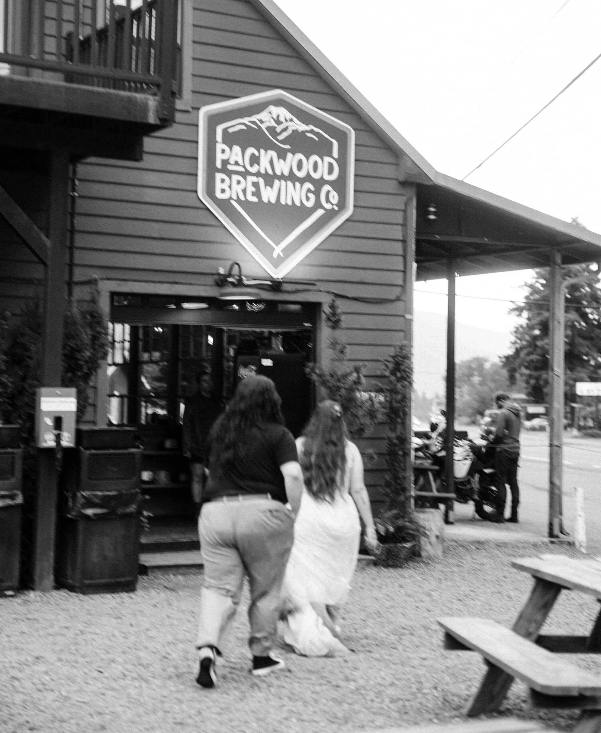 elopement couple heading to a brewery to celebrate elopement